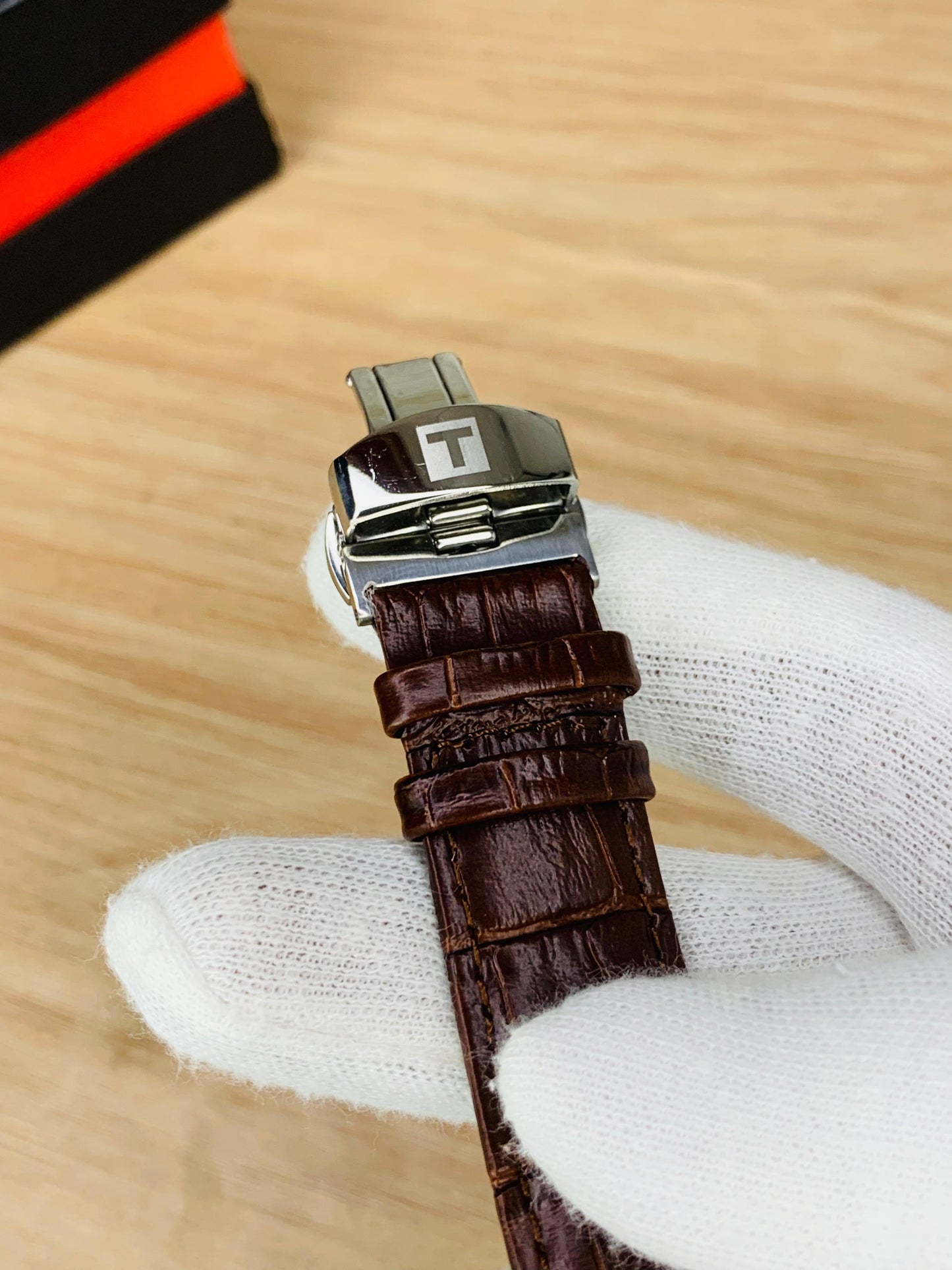 Classic Chronograph Watch with Textured Leather Strap and Multifunction Dial